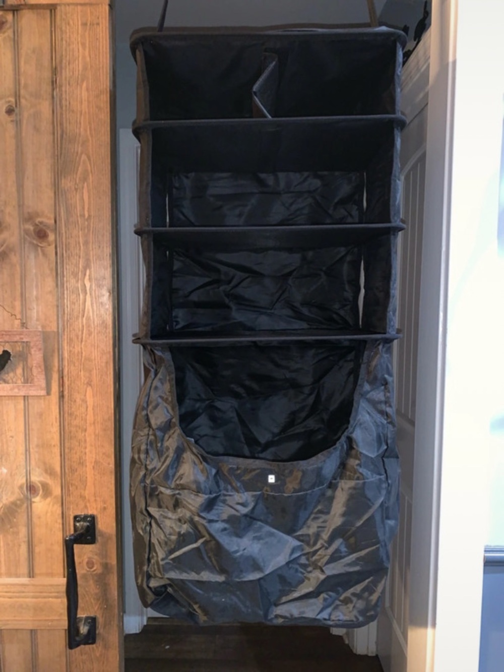 Black Hanging Closet Organizer with Multiple Shelves